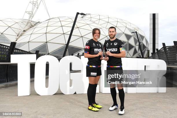 Kayla Morrison and Josh Brillante of the Melbourne Victory pose with the Pride Cup trophy during a media opportunity launching the A-Leagues pride...