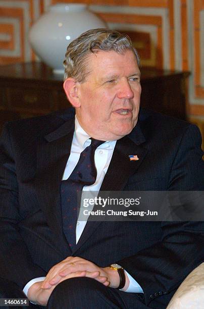 Assistant Secretary of State James Kelly speaks during a meeting with South Korean Foreign Minister Choi Sung-hong at Choi's home October 5, 2002 in...