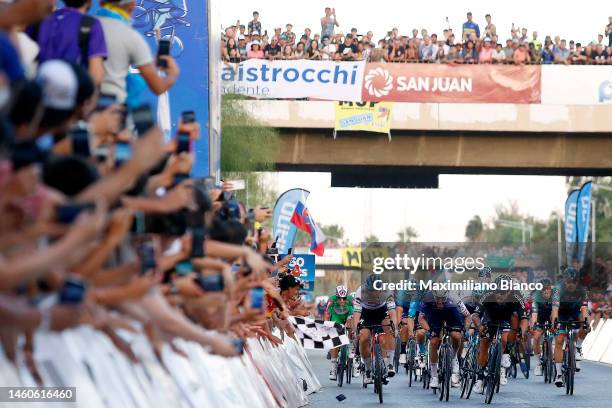 Mobile phone hits the face of Fabio Jakobsen of Netherlands and Team Soudal Quick-Step while Sam Welsford of Australia and Team DSM, Giacomo Nizzolo...