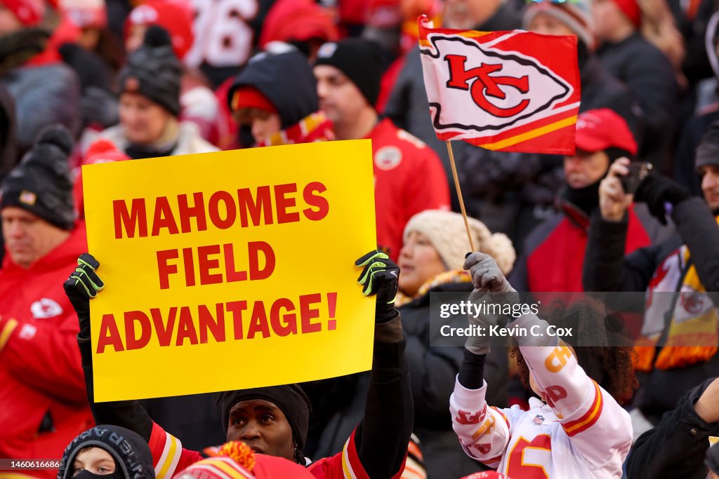 A fan holds up a sign prior to the AFC Championship Game between the A fan holds up a sign prior to the AFC Championship Game between the
