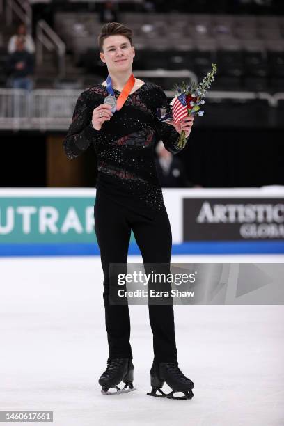 Maxim Naumov poses with his pewter medal after placing fourth in the Championship Men's competition on day four of the 2023 TOYOTA U.S. Figure...