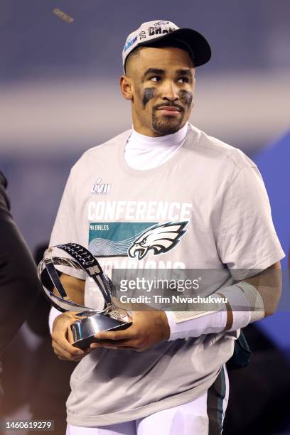 Jalen Hurts of the Philadelphia Eagles holds the George Halas Trophy after defeating the San Francisco 49ers to win the NFC Championship Game at...