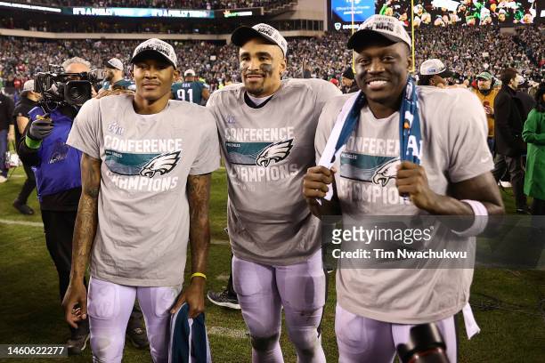 DeVonta Smith, Jalen Hurts and A.J. Brown of the Philadelphia Eagles celebrate after defeating the San Francisco 49ers to win the NFC Championship...
