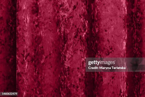 a beautiful versatile background in a stylish burgundy color. color of 2023. viva. magenta.fabric background. - maroon confetti stock pictures, royalty-free photos & images