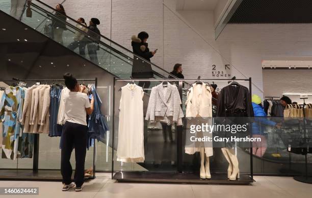 People shop in the Zara store in Soho on January 28 in New York City.