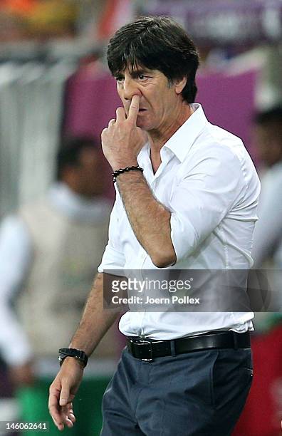 Head Coach Joachim Loew of Germany looks on during the UEFA EURO 2012 group B match between Germany and Portugal at Arena Lviv on June 9, 2012 in...