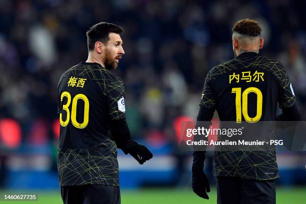 Neymar Jr of Paris Saint-Germain is congratulated by teammate Leo Messi after scori during the Ligue 1 match between Paris Saint-Germain and Stade...