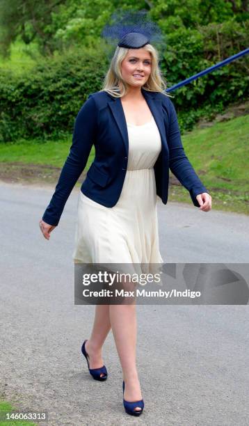 Lady Kitty Spencer attends the wedding of Emily McCorquodale and James Hutt at The Church of St Andrew and St Mary, Stoke Rochford on June 9, 2012 in...