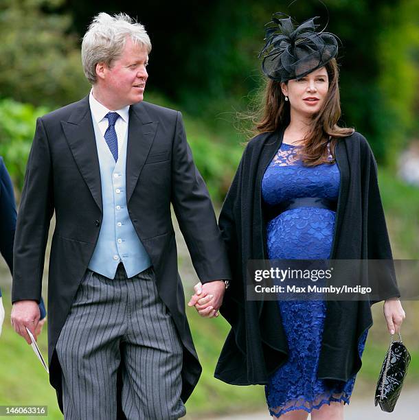 Earl Charles Spencer and his heavily pregnant wife Karen Spencer attend the wedding of Emily McCorquodale and James Hutt at The Church of St Andrew...