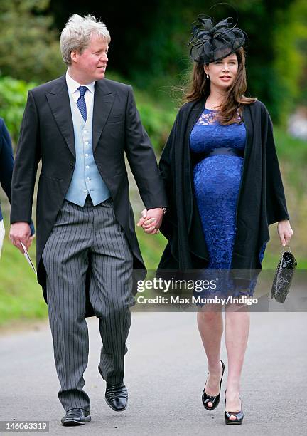 Earl Charles Spencer and his heavily pregnant wife Karen Spencer attend the wedding of Emily McCorquodale and James Hutt at The Church of St Andrew...