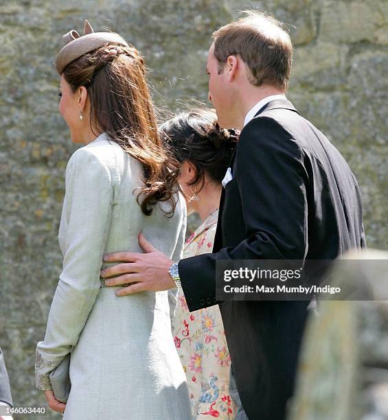 Catherine, Duchess of Cambridge and Prince William, Duke of Cambridge attend the wedding of Emily McCorquodale and James Hutt at The Church of St...