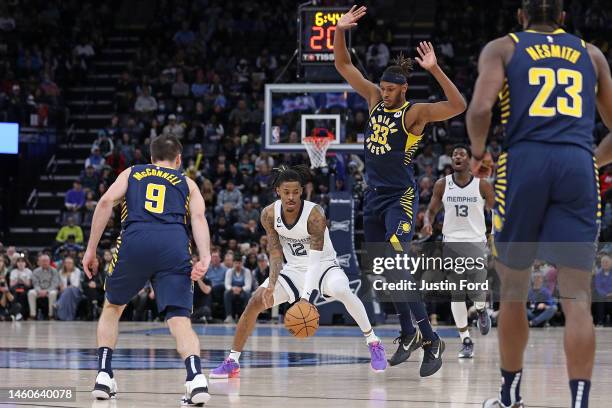 Ja Morant of the Memphis Grizzlies handles the ball during the second half against Myles Turner of the Indiana Pacers at FedExForum on January 29,...