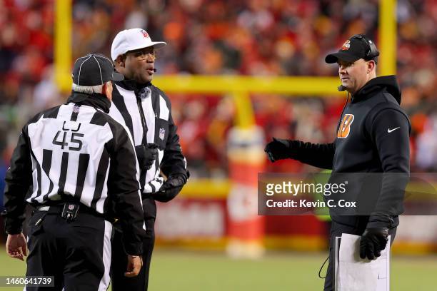 Head coach Zac Taylor of the Cincinnati Bengals talks with referee Ronald Torbert and line judge Jeff Seeman during the third quarter against the...