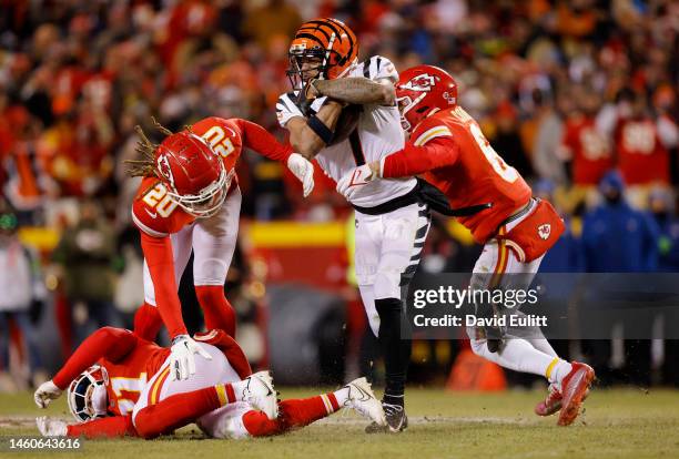 Ja'Marr Chase of the Cincinnati Bengals catches a pass against the Kansas City Chiefs during the third quarter in the AFC Championship Game at GEHA...
