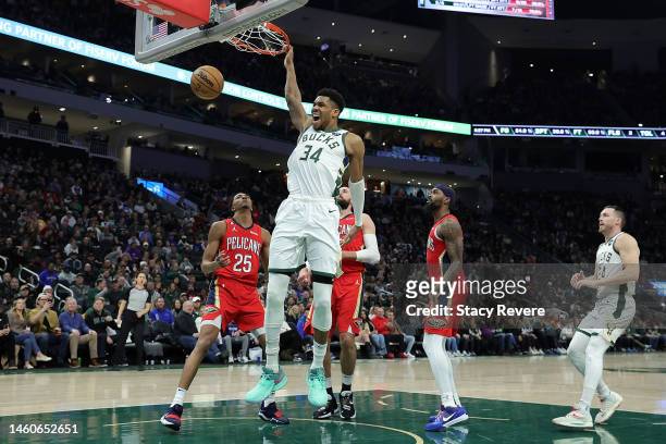 Giannis Antetokounmpo of the Milwaukee Bucks dunks against the New Orleans Pelicans during the second half of a game at Fiserv Forum on January 29,...