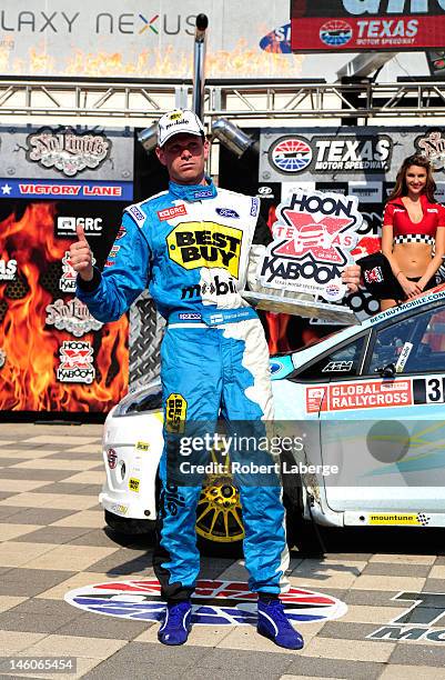 Marcus Gronholm, driver of the Best Buy Mobile/OMSE 2012 Ford Fiesta, celebrates in Victory Lane after winning the Hoon KaboomTX Global Rallycross...