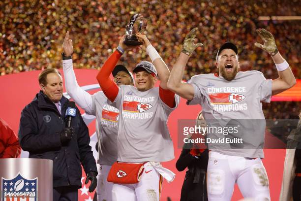 Carlos Dunlap, Patrick Mahomes and Travis Kelce of the Kansas City Chiefs celebrate after defeating the Cincinnati Bengals 23-20 in the AFC...
