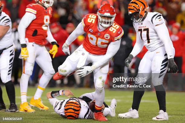 Chris Jones of the Kansas City Chiefs sacks Joe Burrow of the Cincinnati Bengals during the fourth quarter in the AFC Championship Game at GEHA Field...