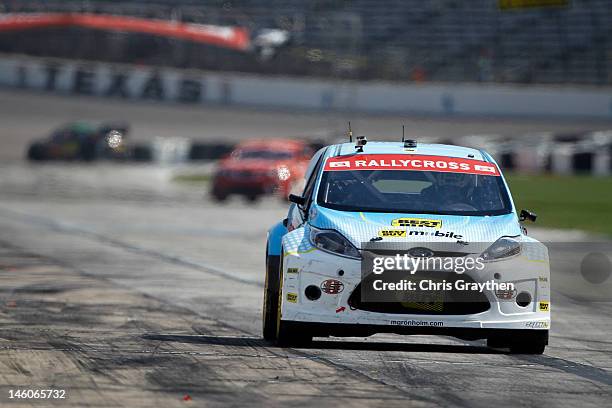 Marcus Gronholm, driver of the Best Buy Mobile/OMSE 2012 Ford Fiesta, races during the Hoon KaboomTX Global Rallycross Championship at Texas Motor...