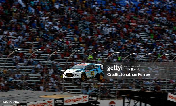 Marcus Gronholm, driver of the Best Buy Mobile/OMSE 2012 Ford Fiesta, jumps during the Hoon KaboomTX Global Rallycross Championship at Texas Motor...