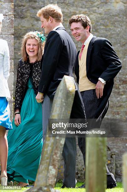 Prince Harry and James Meade attend the wedding of Emily McCorquodale and James Hutt at The Church of St Andrew and St Mary, Stoke Rochford on June...