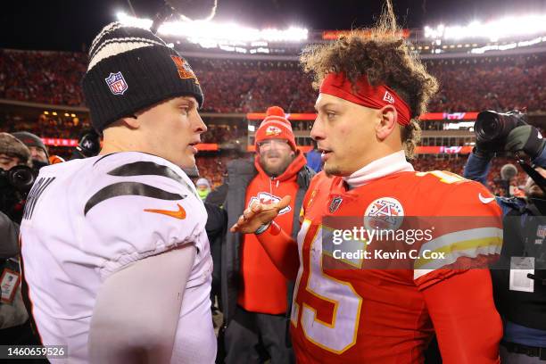 Joe Burrow of the Cincinnati Bengals and Patrick Mahomes of the Kansas City Chiefs meet on the field after the AFC Championship Game at GEHA Field at...