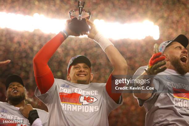 Patrick Mahomes of the Kansas City Chiefs holds up the Lamar Hunt Trophy after defeating the Cincinnati Bengals 23-20 in the AFC Championship Game at...