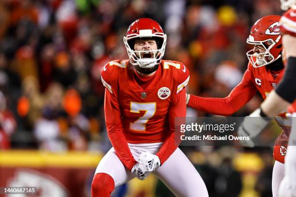 Harrison Butker of the Kansas City Chiefs reacts as he celebrates after kicking the game winning field goal during the AFC Championship NFL football...