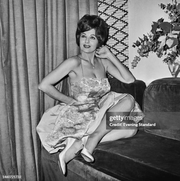American actress and burlesque dancer Tempest Storm posing at the Savoy Hotel in London on December 27th, 1960. Storm is to appear at the Raymond...