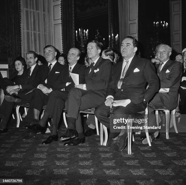 Fashion designers Giuseppe 'Jo' Mattli , Hardy Amies , Charles Creed and Norman Hartnell at an event on February 6th, 1961.