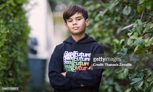portrait of an eleven years old boy looking at the camera - 10 11 years fotografías e imágenes de stock
