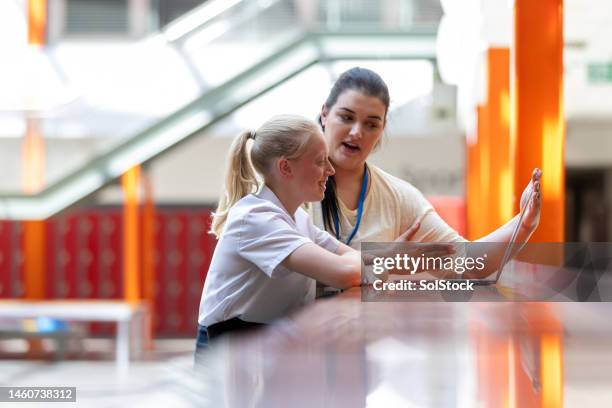 explaining to a student - school counselor stock pictures, royalty-free photos & images