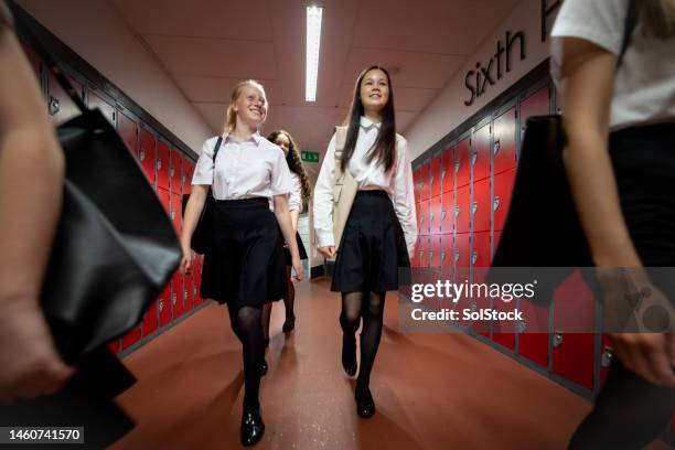 walking through school with friends - 12 year old in skirt stock pictures, royalty-free photos & images