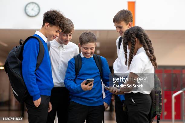 time together in school - talking phone stock pictures, royalty-free photos & images