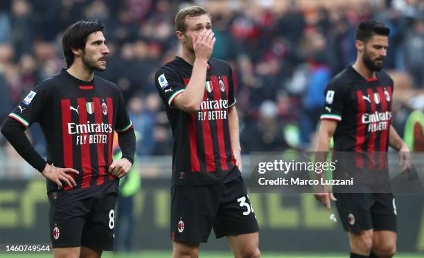 Sandro Tonali, Tommaso Pobega and Olivier Giroud of AC Milan looks dejected following the team's defeat during the Serie A match between AC Milan and...