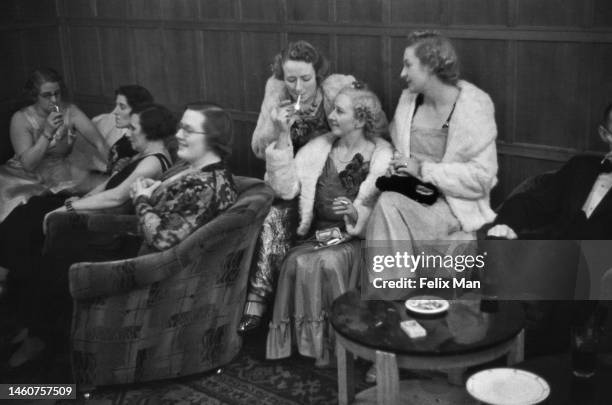 Smartly dressed women enjoying themselves at the Whitchurch Ratepayers Association third annual dance, Cardiff. Original Publication: Picture Post -...