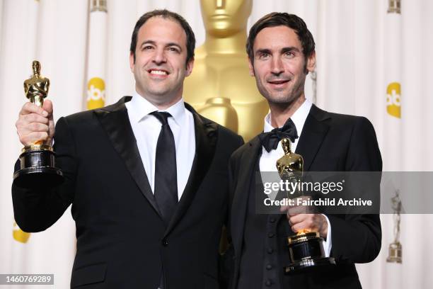 Best Documentary Feature winners Malik Bendjelloul and Simon Chinn in the press room at the 85th annual Academy Awards at the Loews Hollywood Hotel.