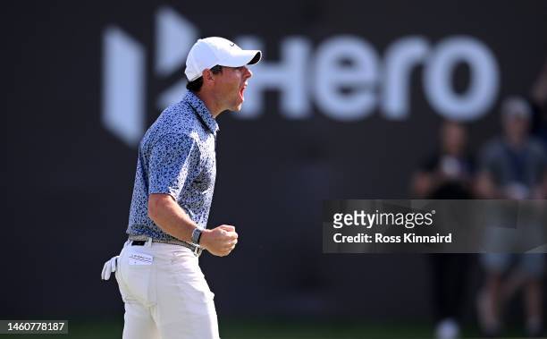Rory McIlroy of Northern Ireland celebrates after holing the winning putt on the 18th green during the final round of the Hero Dubai Desert Classic...