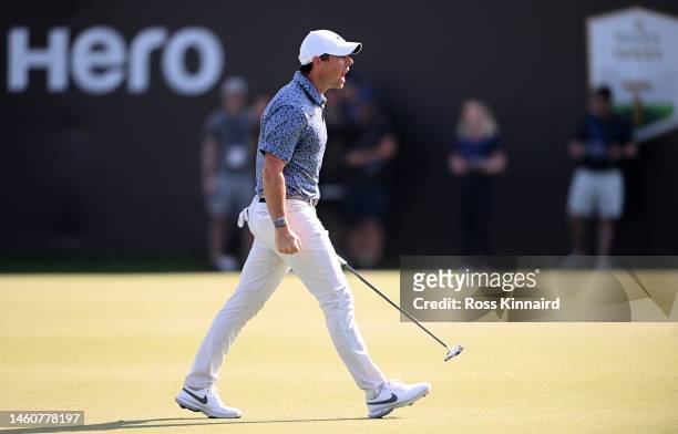 Rory McIlroy of Northern Ireland celebrates after holing the winning putt on the 18th green during the final round of the Hero Dubai Desert Classic...