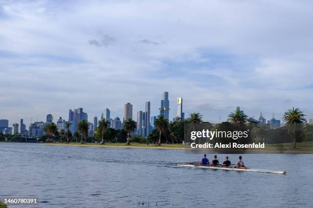 People row in the water at Albert Park with a view of the Melbourne skyline in the background on January 30, 2023 in Melbourne, Australia. On July 6,...