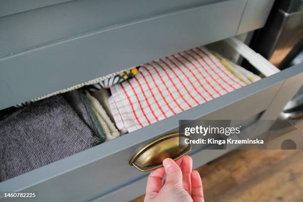 kitchen drawers - theedoek stockfoto's en -beelden