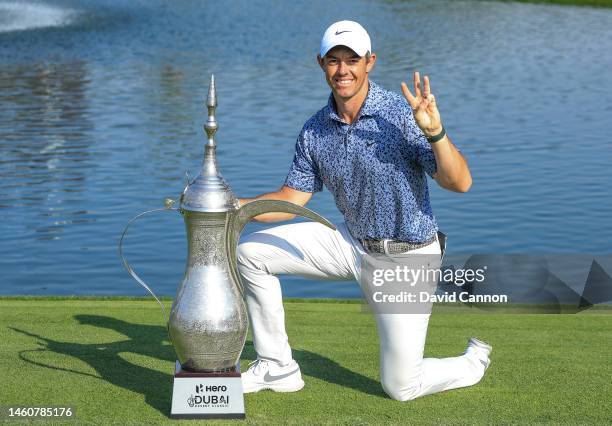 Rory McIlroy of Northern Ireland poses with the 'Dalah' trophy after the final round on Day Five of the Hero Dubai Desert Classic on The Majlis...