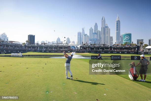 Rory McIlroy of Northern Ireland plays his third shot on the 18th hole during the final round on Day Five of the Hero Dubai Desert Classic on The...