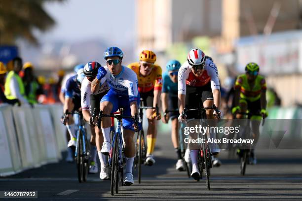 Dylan Groenewegen of The Netherlands and Team Jayco Alula celebrates at finish line as stage winner ahead of Maximilian Richard Walscheid of Germany...