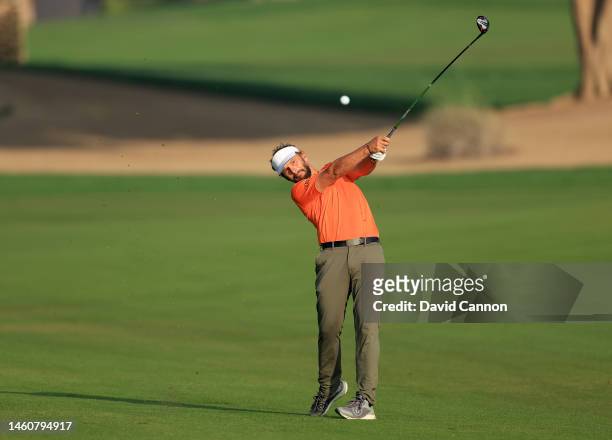 Joost Luiten of The Netherlands plays his second shot on the 10th hole during the final round on Day Five of the Hero Dubai Desert Classic on The...