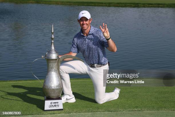 Rory McIlroy of Northern Ireland poses with the Hero Dubai Desert Classic trophy on the 18th green, following victory in the Final Round on Day Five...