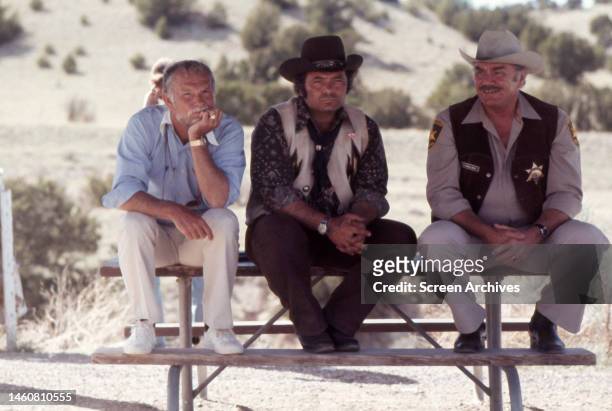 Director Sam Peckinpah with actors Ernest Borgnine and Burt Young on the set of the 1978 movie.