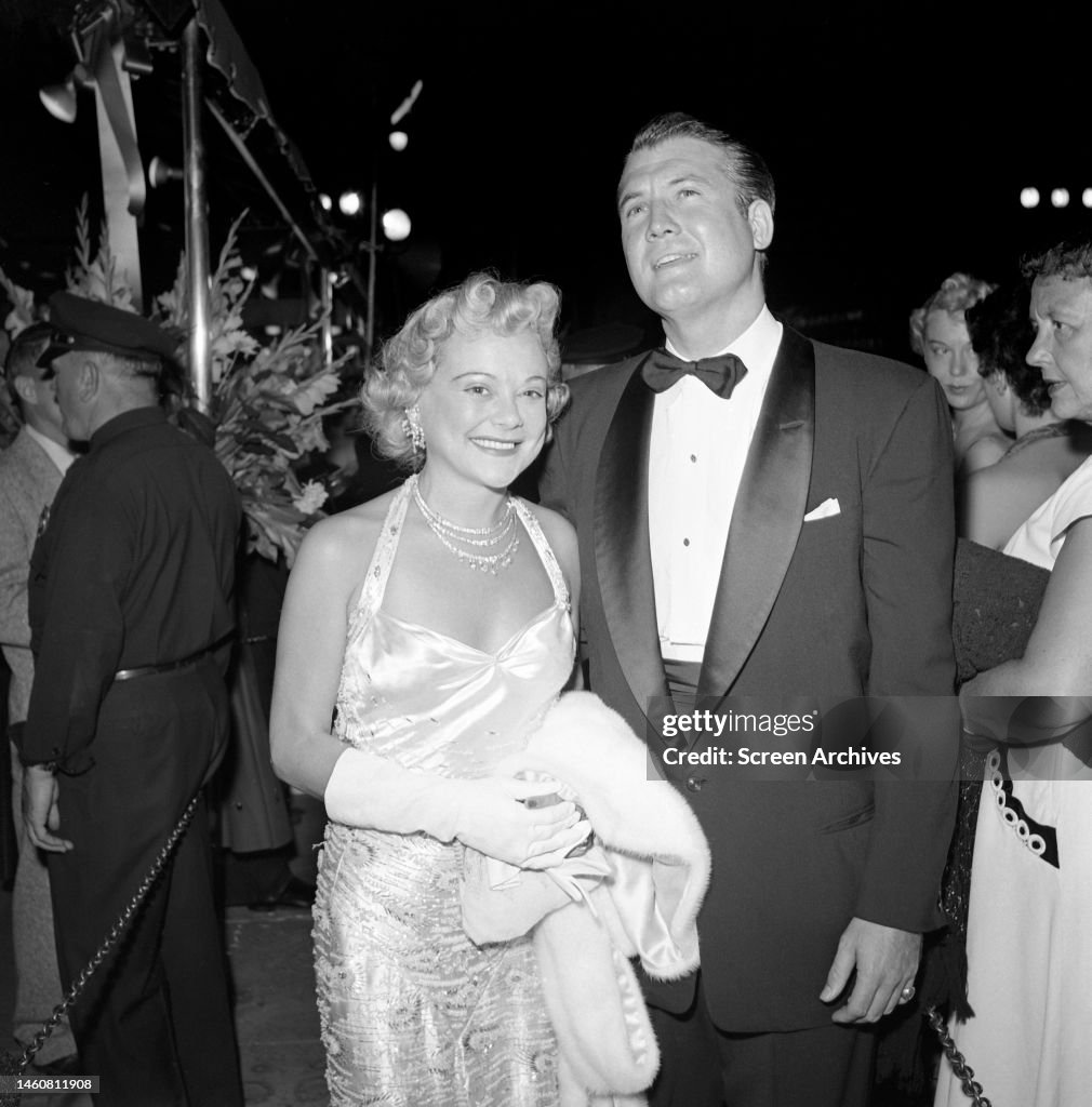 George Reeves Exercising American actor George Reeves with olympic skater and actress Sonja ...
