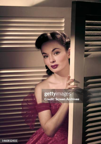 American actress Ann Blyth in a red dress, circa 1950.