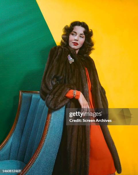 American actress Jennifer Jones in a fur coat, circa 1945.